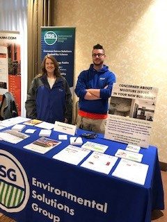 Environmental Solutions Group staff greeting visitors at an industry expo booth in North Carolina